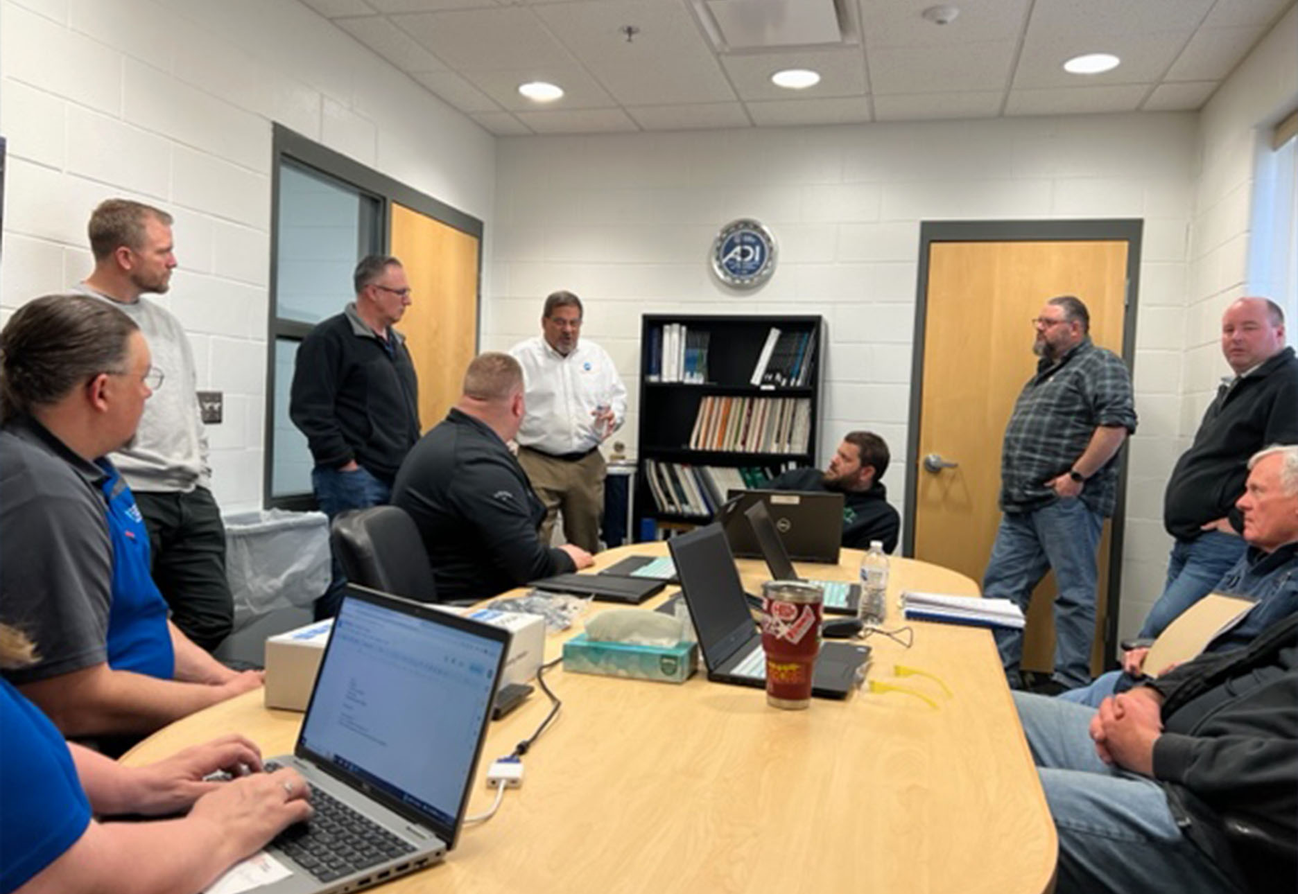 ASE Instructor Marlo Miranda with ASE ETL trainees at the Auto/Diesel Institute of Michigan.