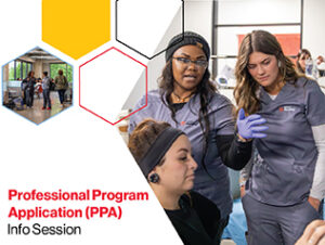 Two students in scrubs watch an instructor demonstrate during a lab session.