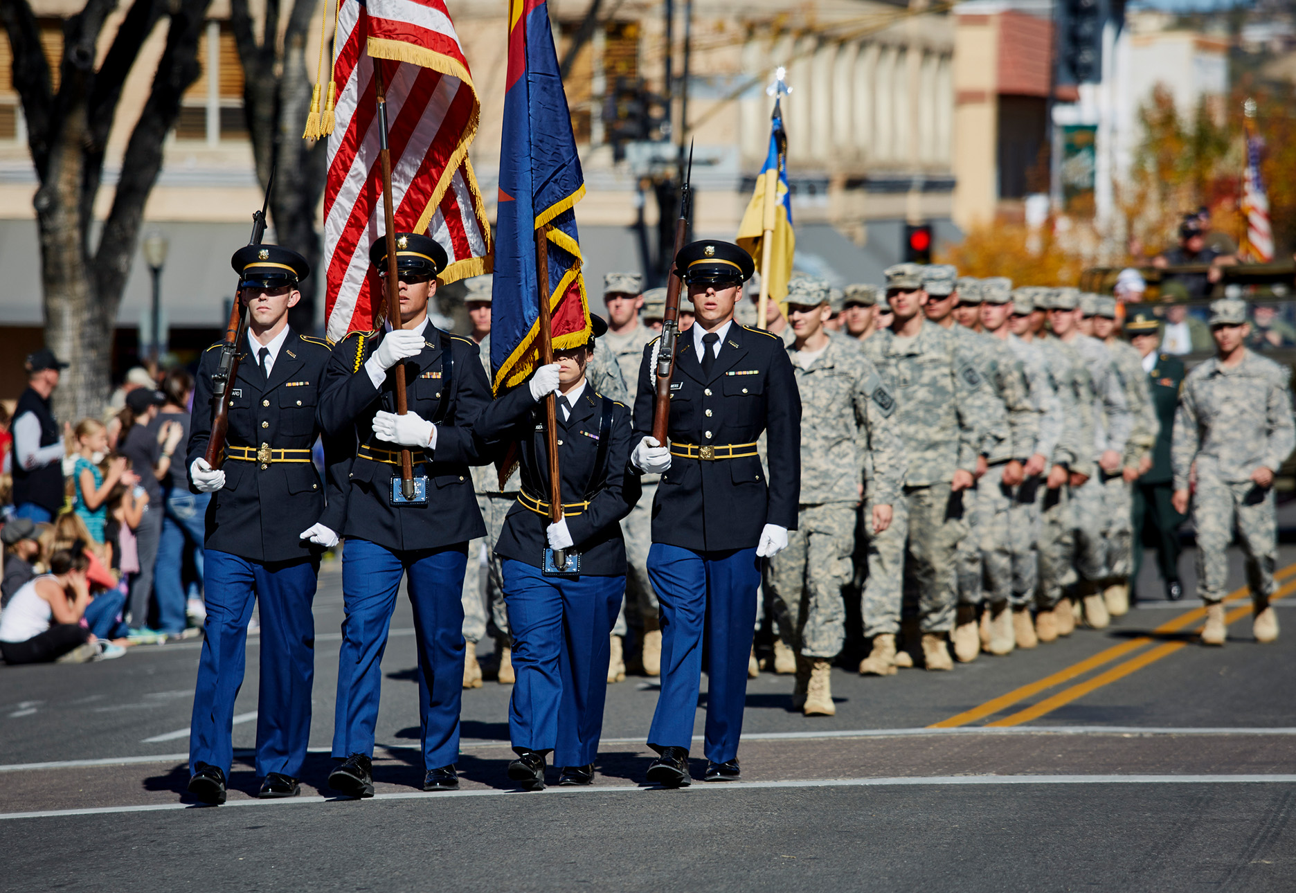 ROTC Members marching in a Veterans Day Parade