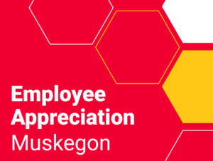 White text on a red background says Employee Appreciation Muskegon next to honeycomb shapes in white and yellow.
