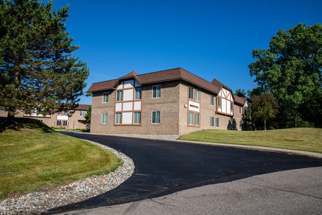 An exterior photo of a student housing building at Baker College.