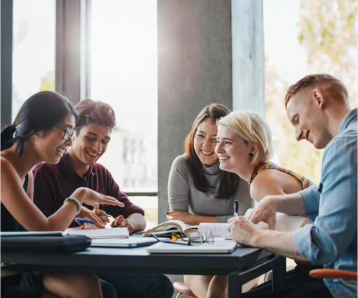 Students collaborating at a table.