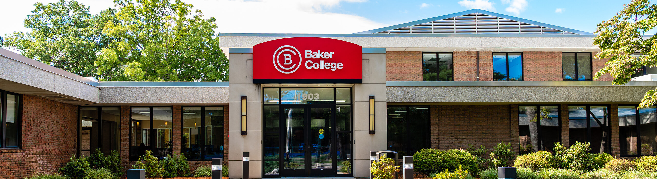 Exterior photo of Baker College Muskegon campus on a bright, sunny day 