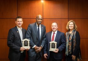 Pictured left to right: Baker College Metro Campus President Dr. Pete Karsten, President of Graystone Security and Protection Services Dr. J.R. Taylor, Baker College President Dr. Bart Daig, and Board Chair of Baker College of Auburn Hills Board of Regents Susan Ebeling.