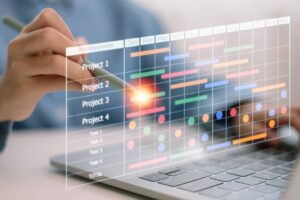 Project manager working and updating tasks with milestones and progress planning. 