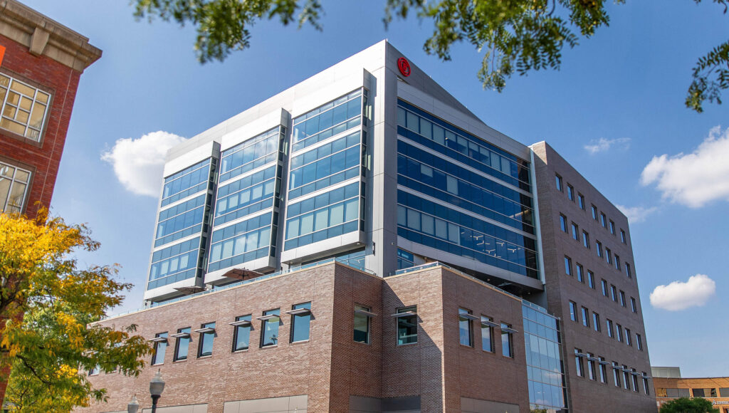 An exterior photo of the Royal Oak campus on a sunny day.